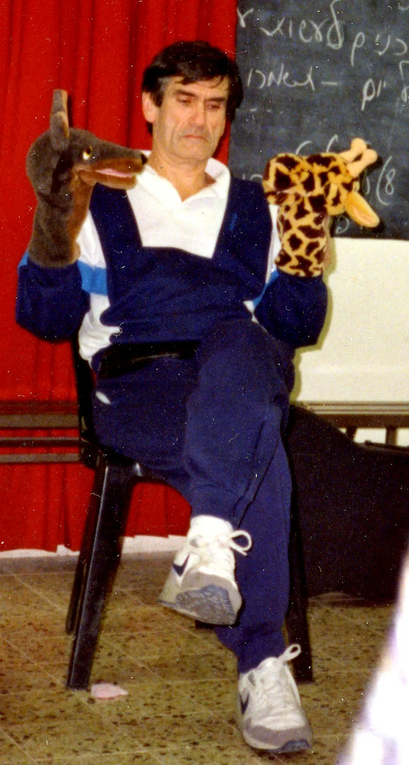 Marshall Rosenberg with hand puppets